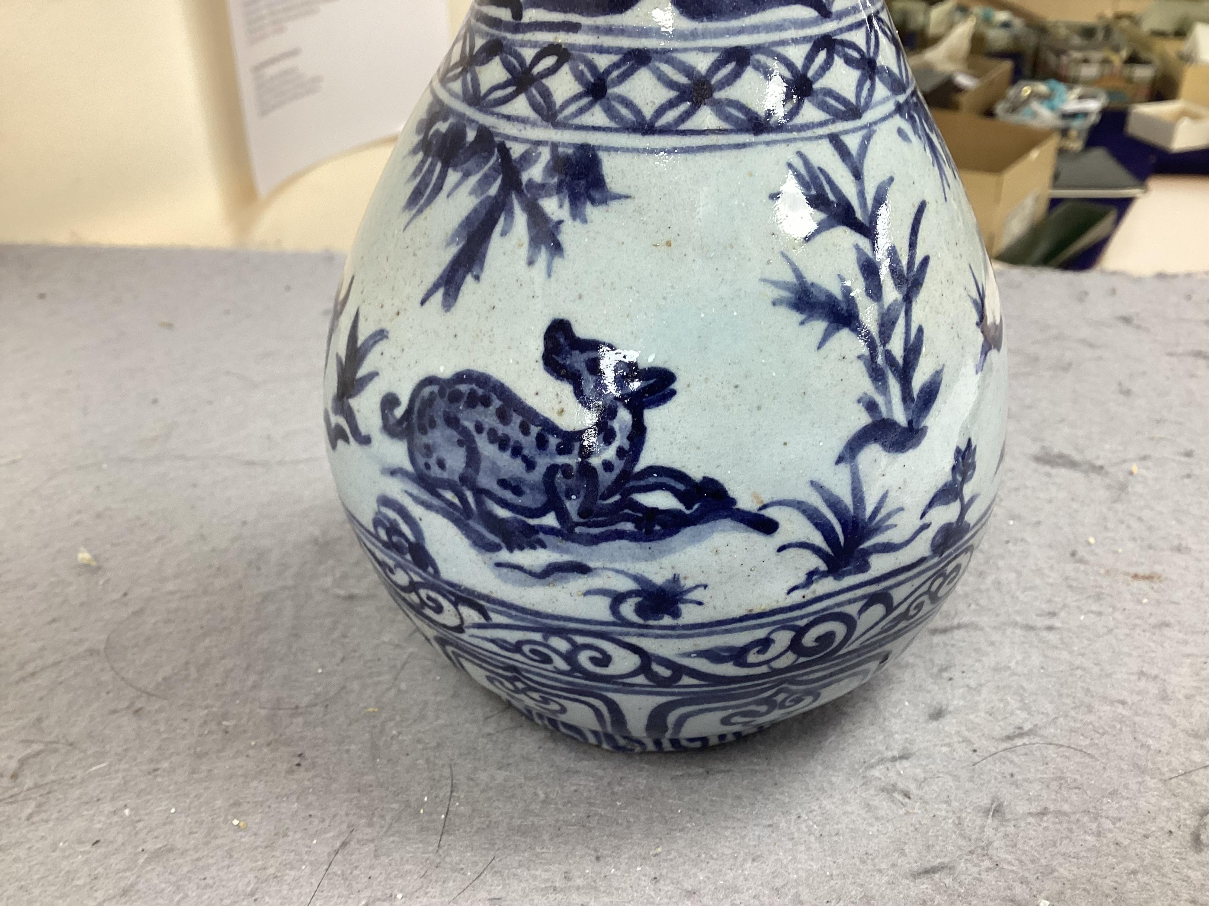 A group Oriental ceramics including Chinese famille rose plates, various tea bowls, a teapot, vases etc., tallest blue and white vase 21.5cm high (28). Condition - fair